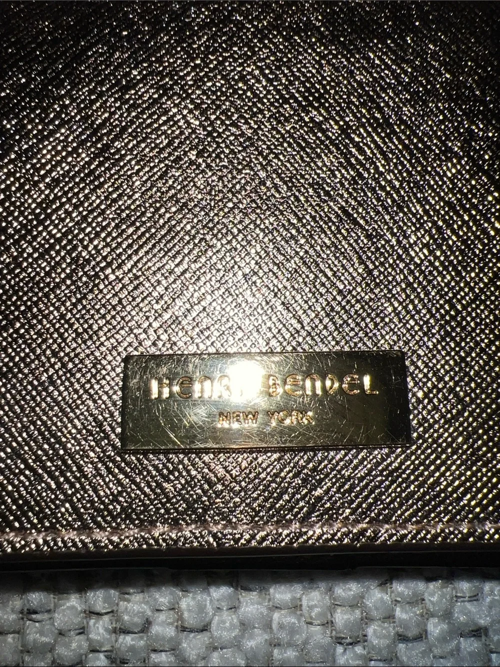 henri bendel metallic rose gold wallet with gold-tone plaque